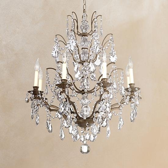 A bronze finish chandelier with Legacy crystal glass.