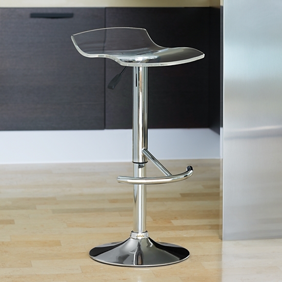 A backless clear adjustable stool.