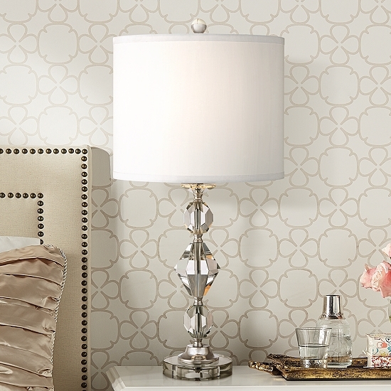 A table lamp design with a crystal base. A table lamp with a crystal base design.
