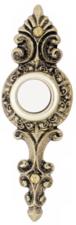 A decorative doorbell in antique bronze. An antique brass doorbell design.
