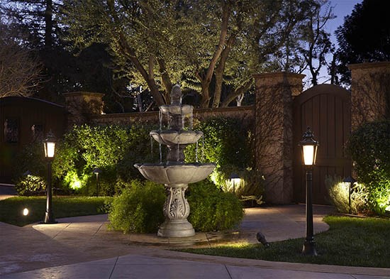 Outdoor fountain and landscape lighting.