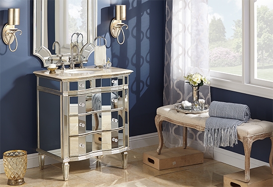 A powder room with mirrored fixtures.