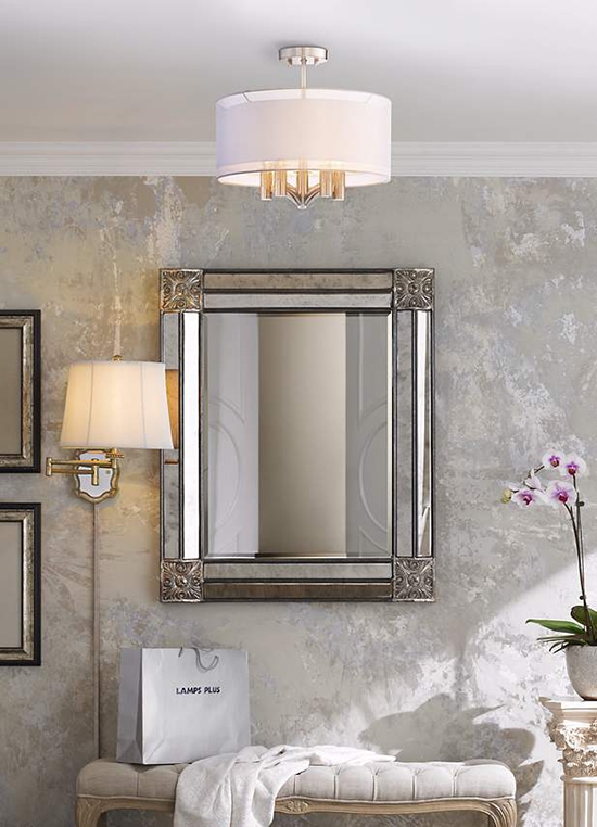 A semi-flush ceiling light over an entryway.