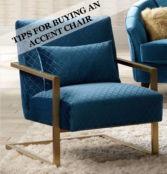 A blue accent chair with a pillow.