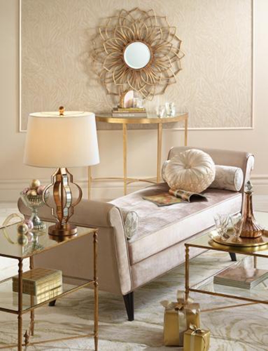 Gold and silver table lamp and gold sunburst mirror from Lamps Plus. 