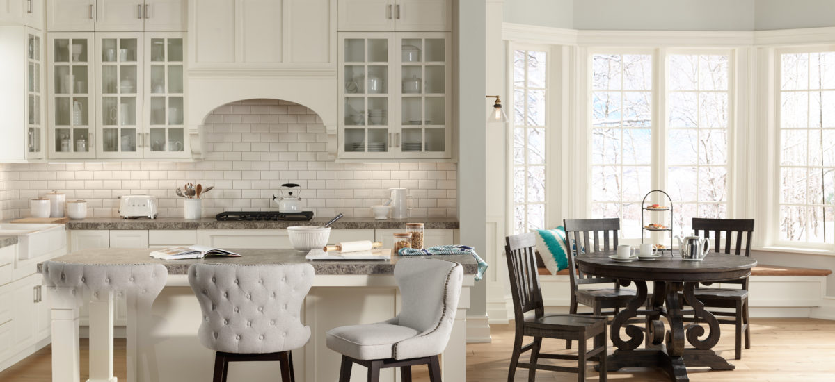 Contemporary kitchen and breakfast area with recessed lights