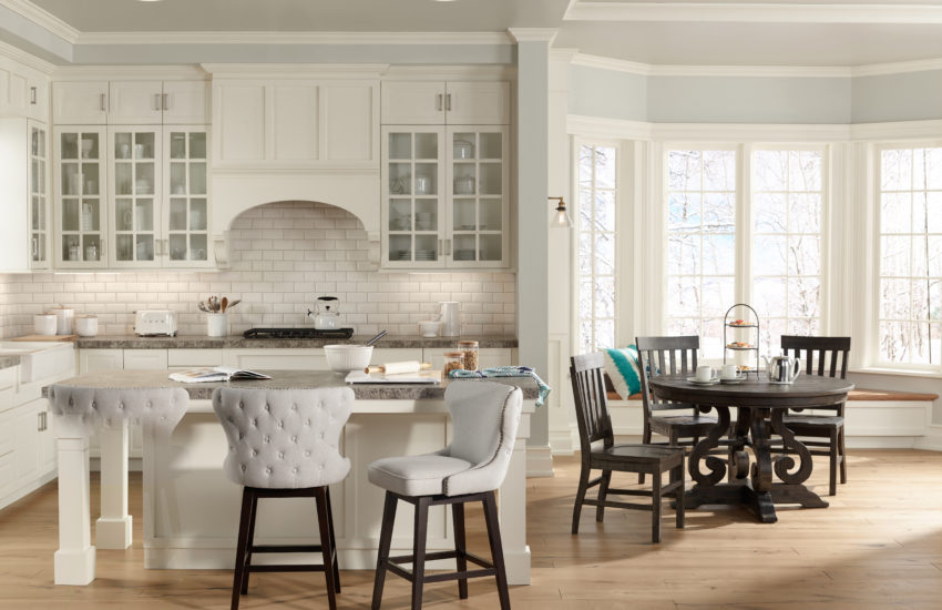 Contemporary kitchen and breakfast area with recessed lights