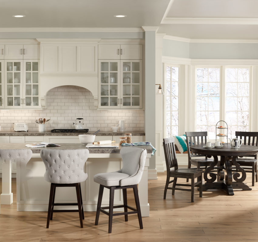 Contemporary kitchen and breakfast area with recessed lights