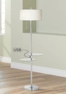 A floor lamp with two shelves and a USB outlet. 