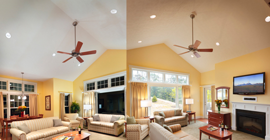 A before and after living room scene with recessed lighting in the after photograph. 