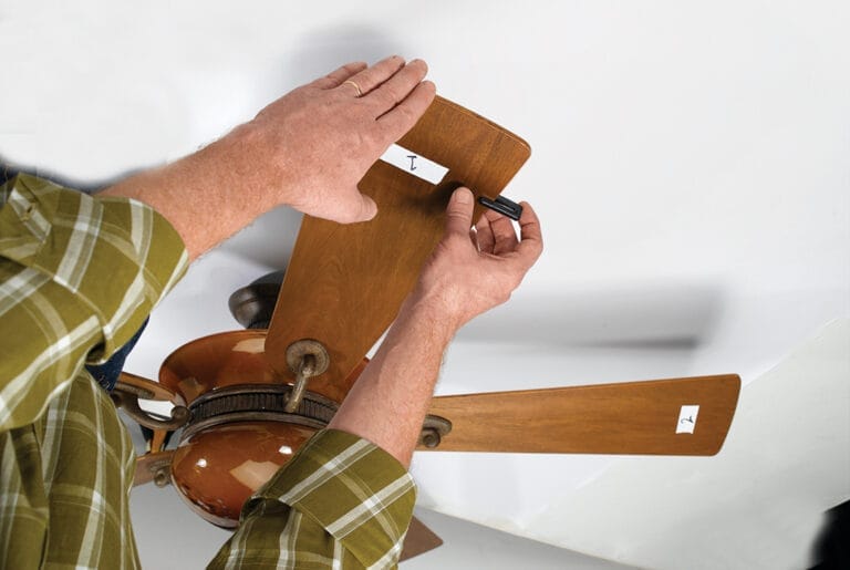 A ceiling fan with the temporary attachment
